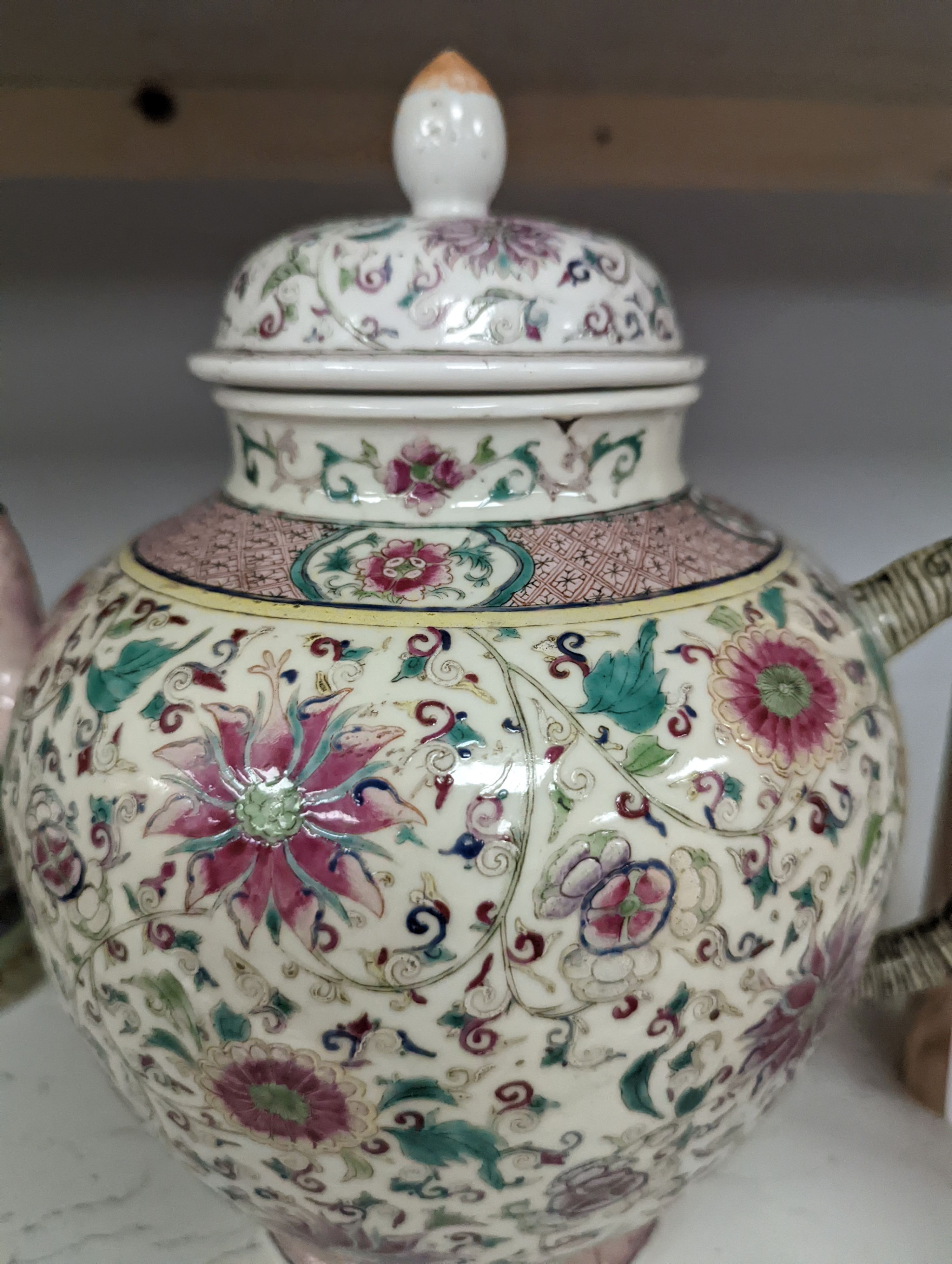 A large 19th century Chinese famille rose wine pot, and another wine pot, tallest 27cm